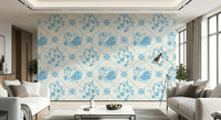 Blue-and-white Delft floral wallpaper behind sofa in apartment, classic botanical wall decor