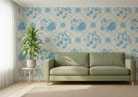 Delft-style bloom wallpaper in nursery, soft blue florals, gentle pattern for wall decor
