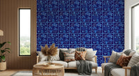 Bedroom accent wall in dark delft blue floral tiles, vintage ceramic look, patterned wall décor