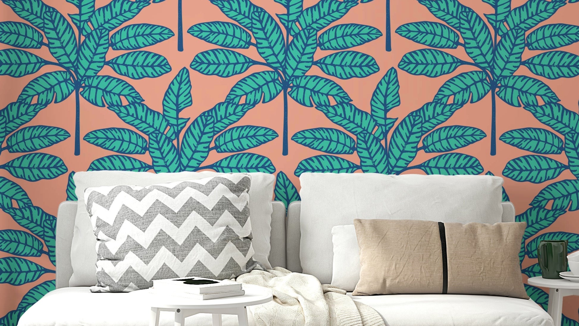 Tropical oasis wallpaper featuring desert leaves in soothing blue and soft pink.

