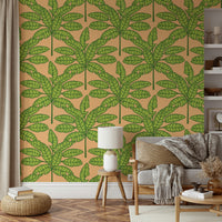 Retro tropical design with bold green foliage and orange highlights.


