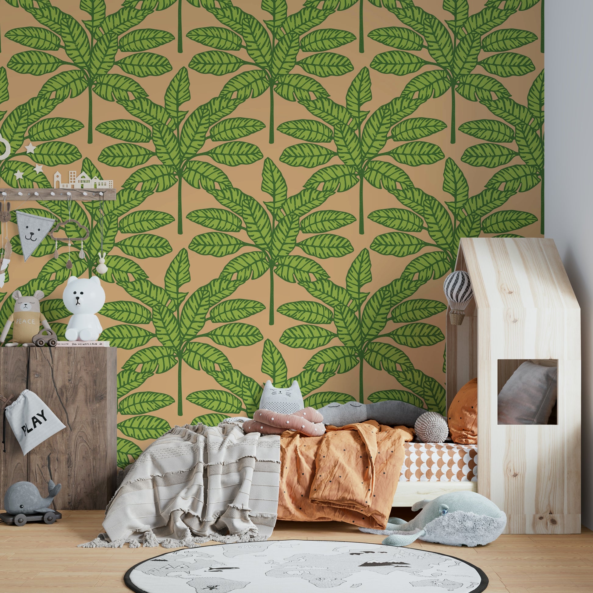 Mid-century modern wallpaper with bold desert leaves in green and orange.

