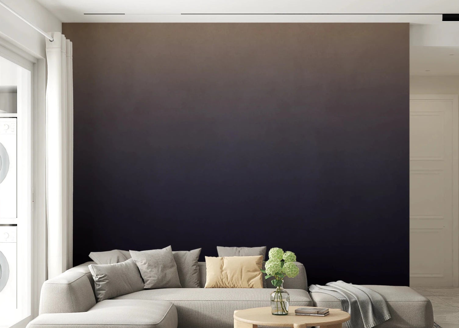 Dirty Paper - Ombre Dusk wallpaper mural fading tan to navy behind a cream sectional in a living room