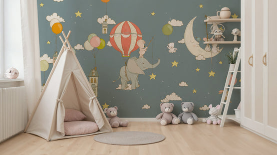 Dreamy Sky Friends wallpaper mural with elephant and balloon in a nursery with a beige teepee tent and teddy bears