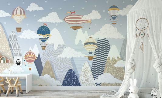 The design features hot air balloons and clouds.

