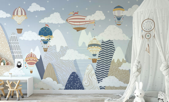 The design features hot air balloons and clouds.

