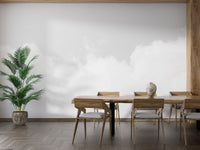 Cloud Dancer wallpaper mural featuring soft fluffy clouds in a blue sky.