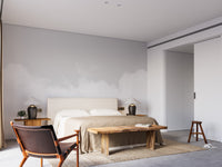 Peel and stick cloud theme wallpaper installed in a modern bedroom