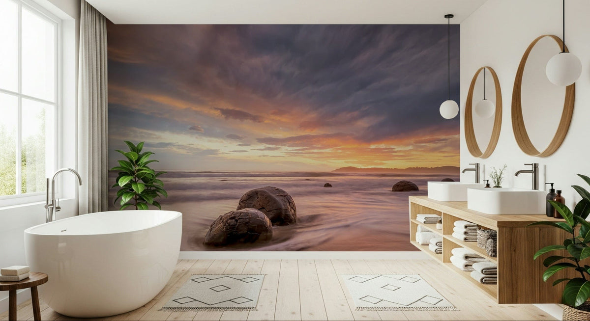 Coastal Stones at Dusk wallpaper mural of sunset boulders on a beach in a bathroom with freestanding tub and wood vanity