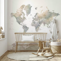 Neutral world map wall décor with watercolor textures

