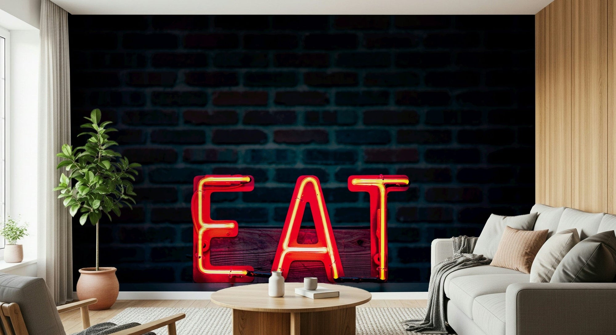 Eat Neon Sign wallpaper mural with red neon lettering on dark brick behind a beige sofa in a bright living room