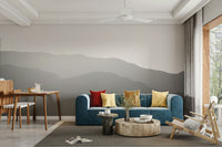 The wallpaper is used as a feature wall in a bedroom.

