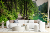 Emerald lake wallpaper in bedroom, calm water and trees above headboard