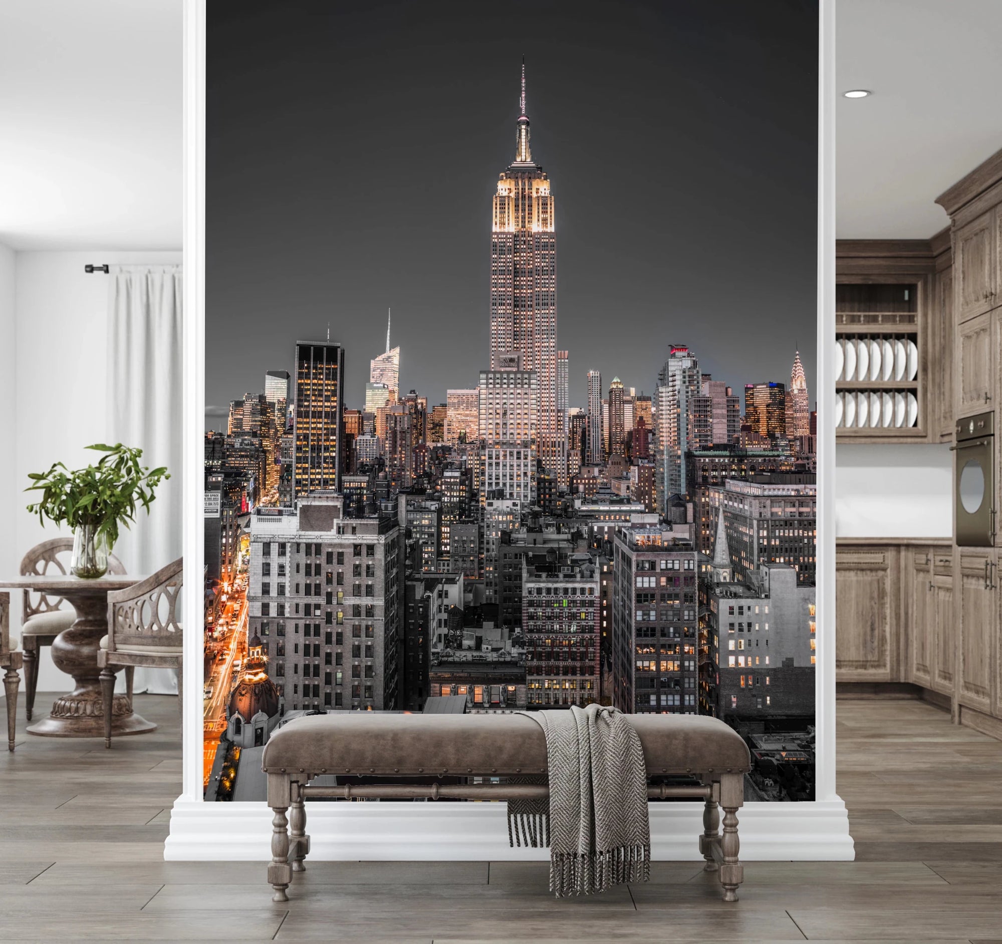 Empire State Building mural of the lit skyline above an upholstered bench in a wood-toned entryway
