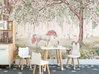 Unicorn Forest Green Wallpaper Mural peel and stick in a playroom with a blue sofa and a white play teepee.