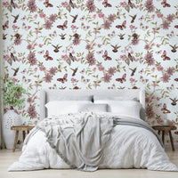 Moody floral mural with lush botanicals and vibrant wildlife.

