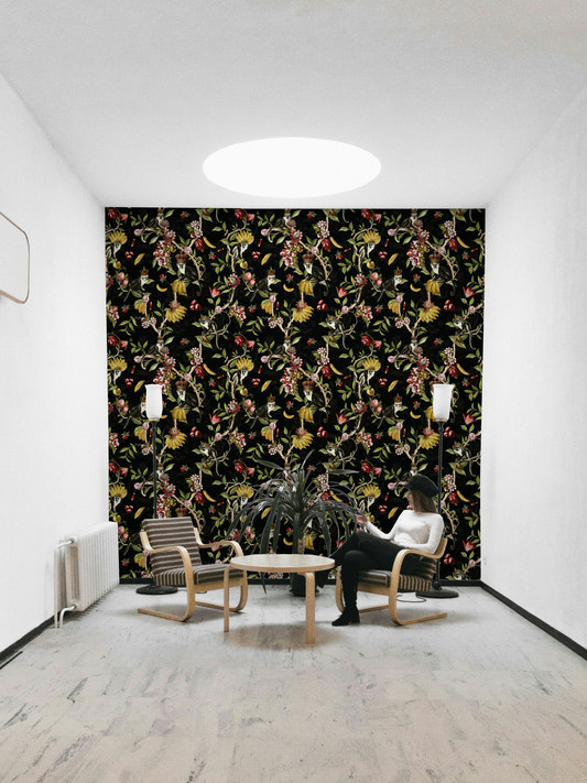 Enchanted Primate Paradise Wallpaper featuring playful monkeys and vibrant flowers.


