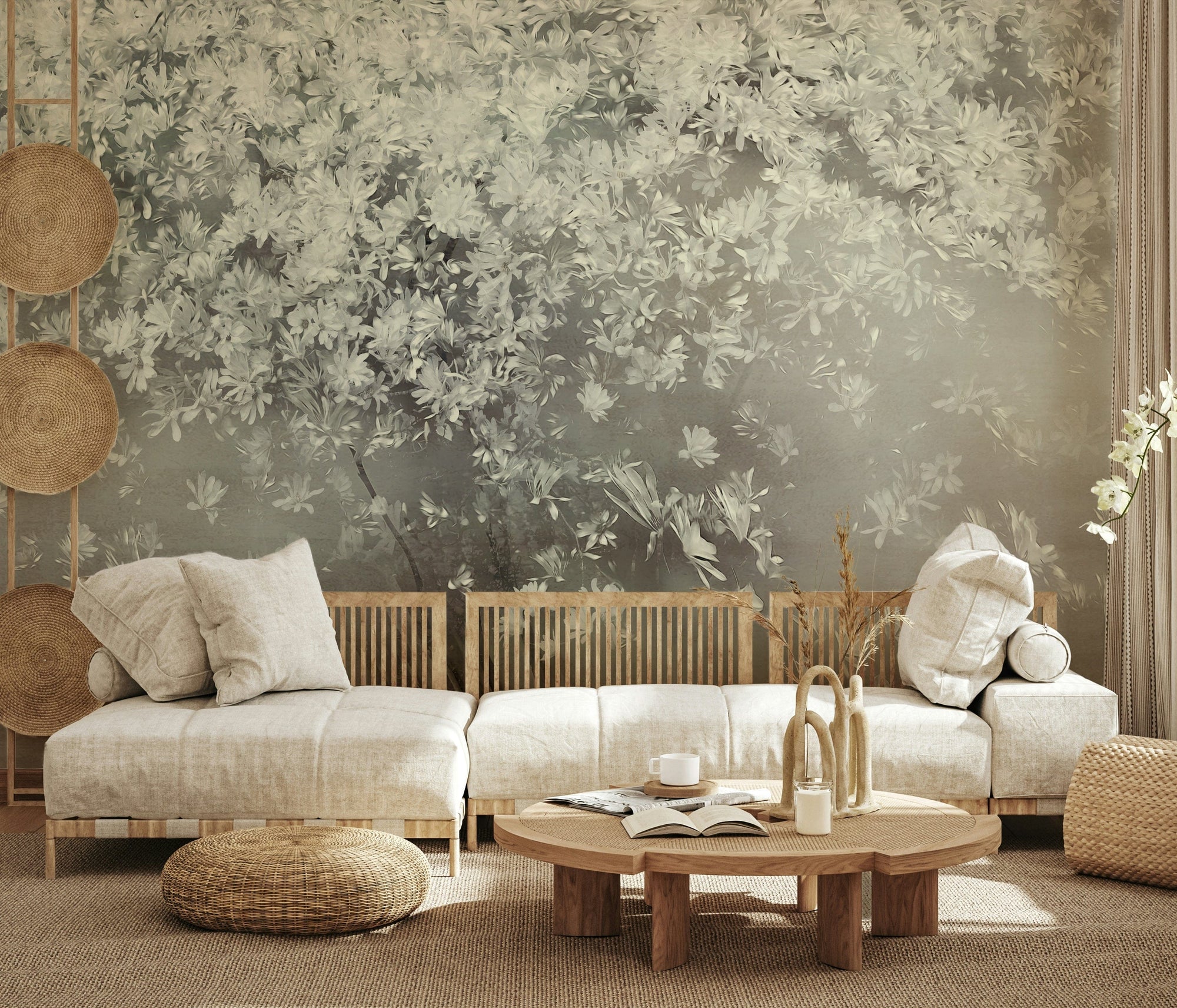 Ethereal Bloom Tree wallpaper mural of white blossoms above a low cream sectional and round coffee table