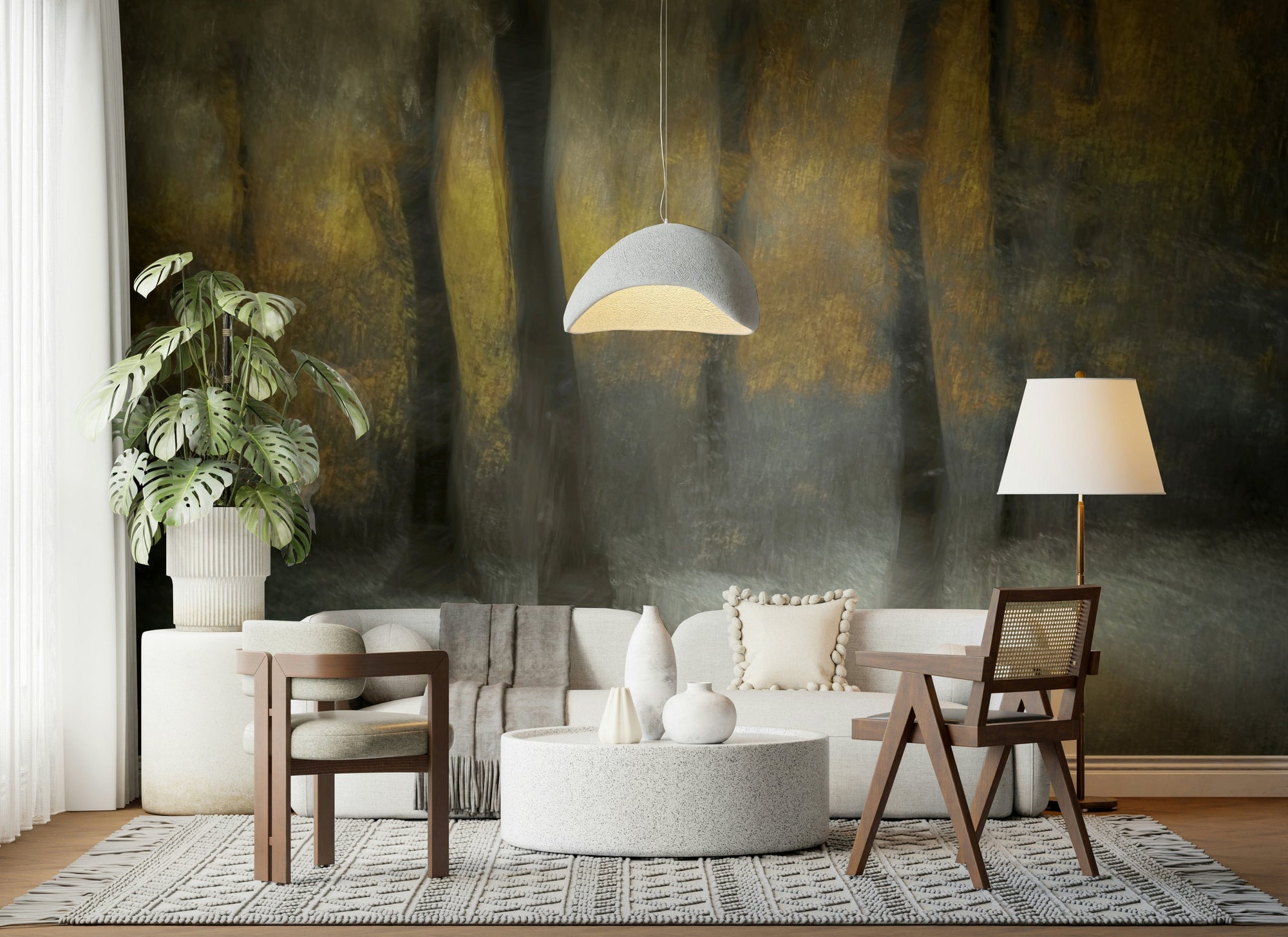 Ethereal Forest Whispers wallpaper mural of misty golden woodland behind a cream sofa and cane armchair in a living room