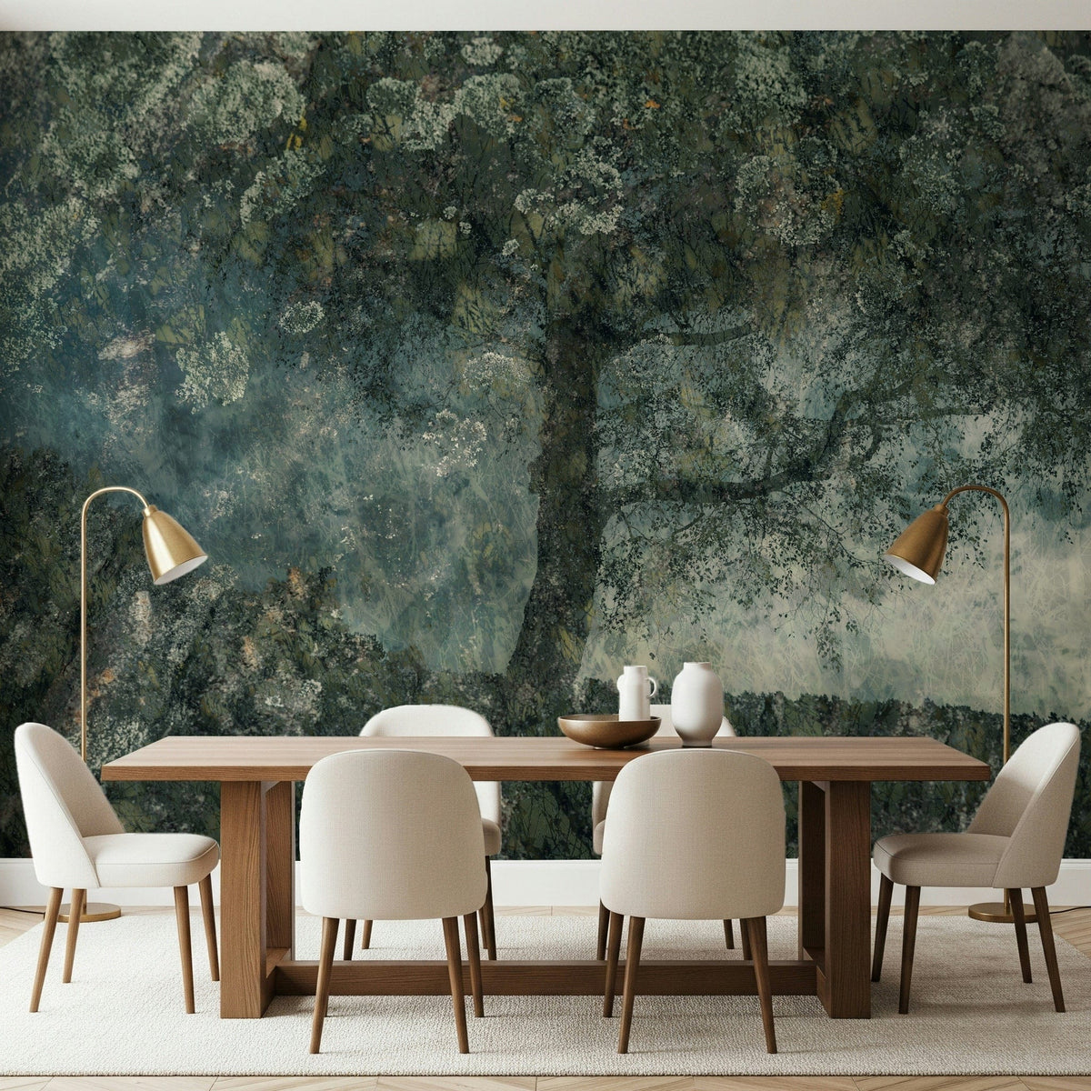 Ghostly Grove wallpaper mural of a mossy green tree behind a walnut dining table and cream chairs
