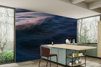 A peaceful open ocean mural on decorative wallpaper.

