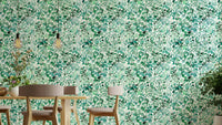 Eucalyptus leaves jungle wallpaper in green tones

