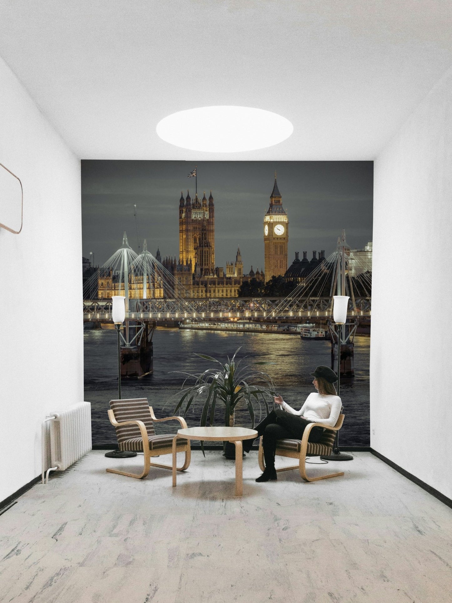 Illuminated bridge over the River Thames.

