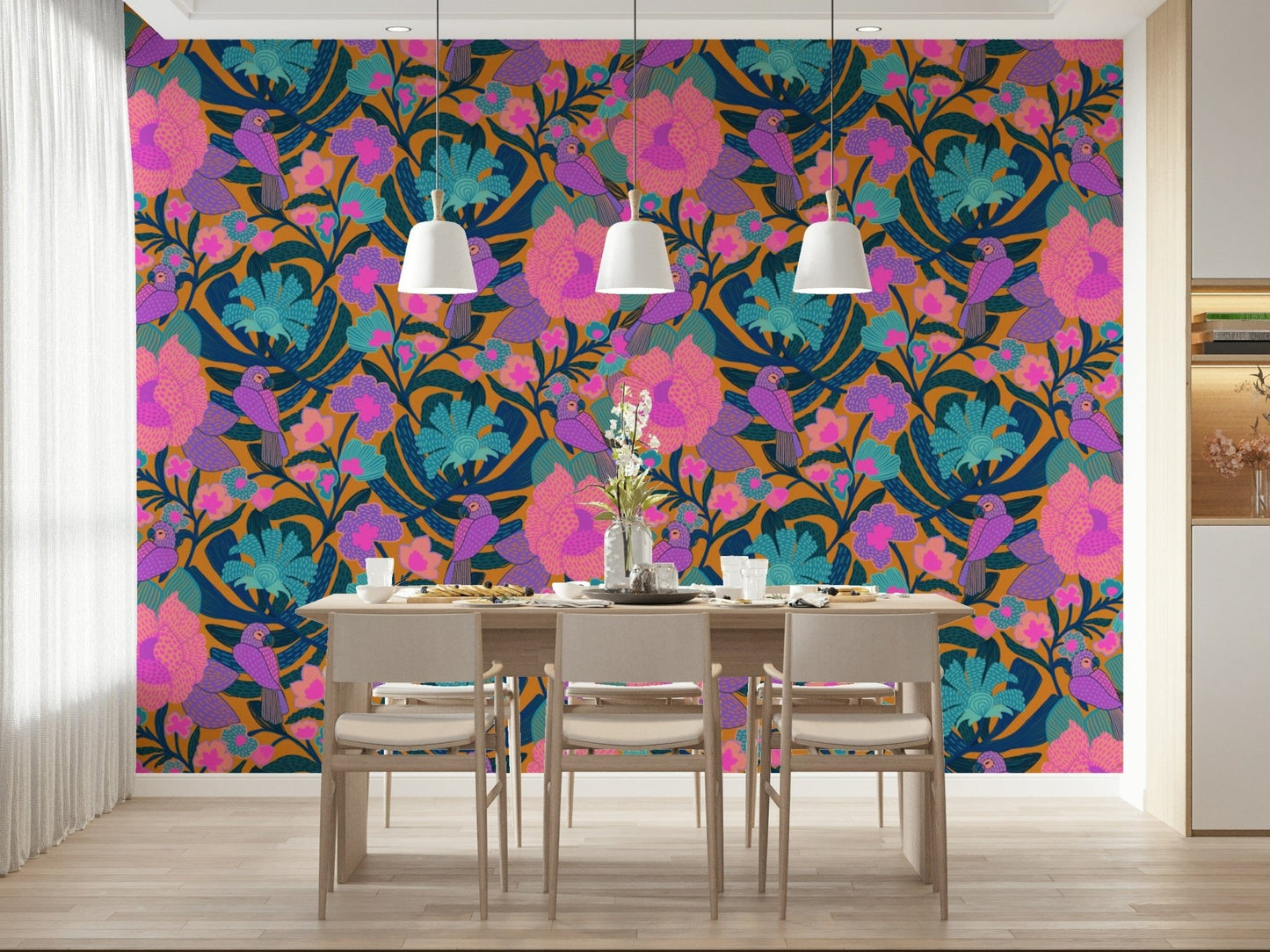 Exotic Bloom wallpaper behind a light wood dining table and chairs under three white dome pendant lamps