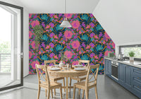 Exotic Bloom wallpaper in a kitchen dining nook with a wood round table, X-back chairs and trailing plant