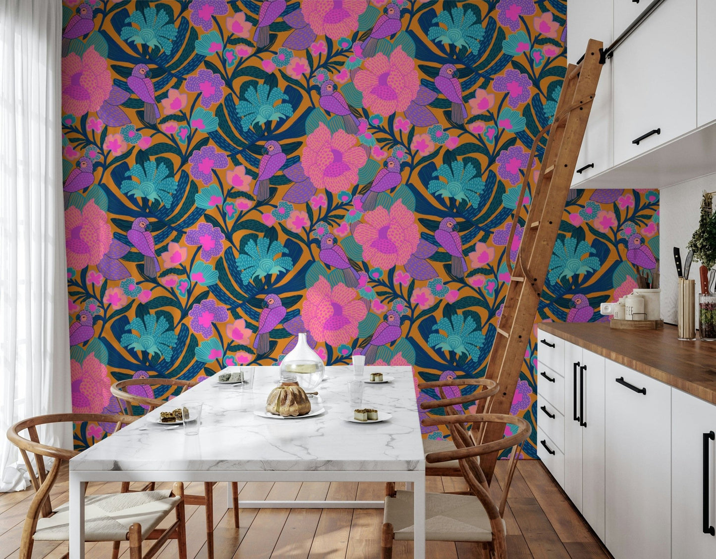 Exotic Bloom wallpaper in a kitchen dining nook with a white marble table, wishbone chairs and library ladder