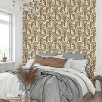 The wallpaper is used to create a feature wall in a dining room.