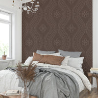 Rich neutral wallpaper with faded pattern

