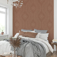 Vintage-style damask wallpaper in mocha tones

