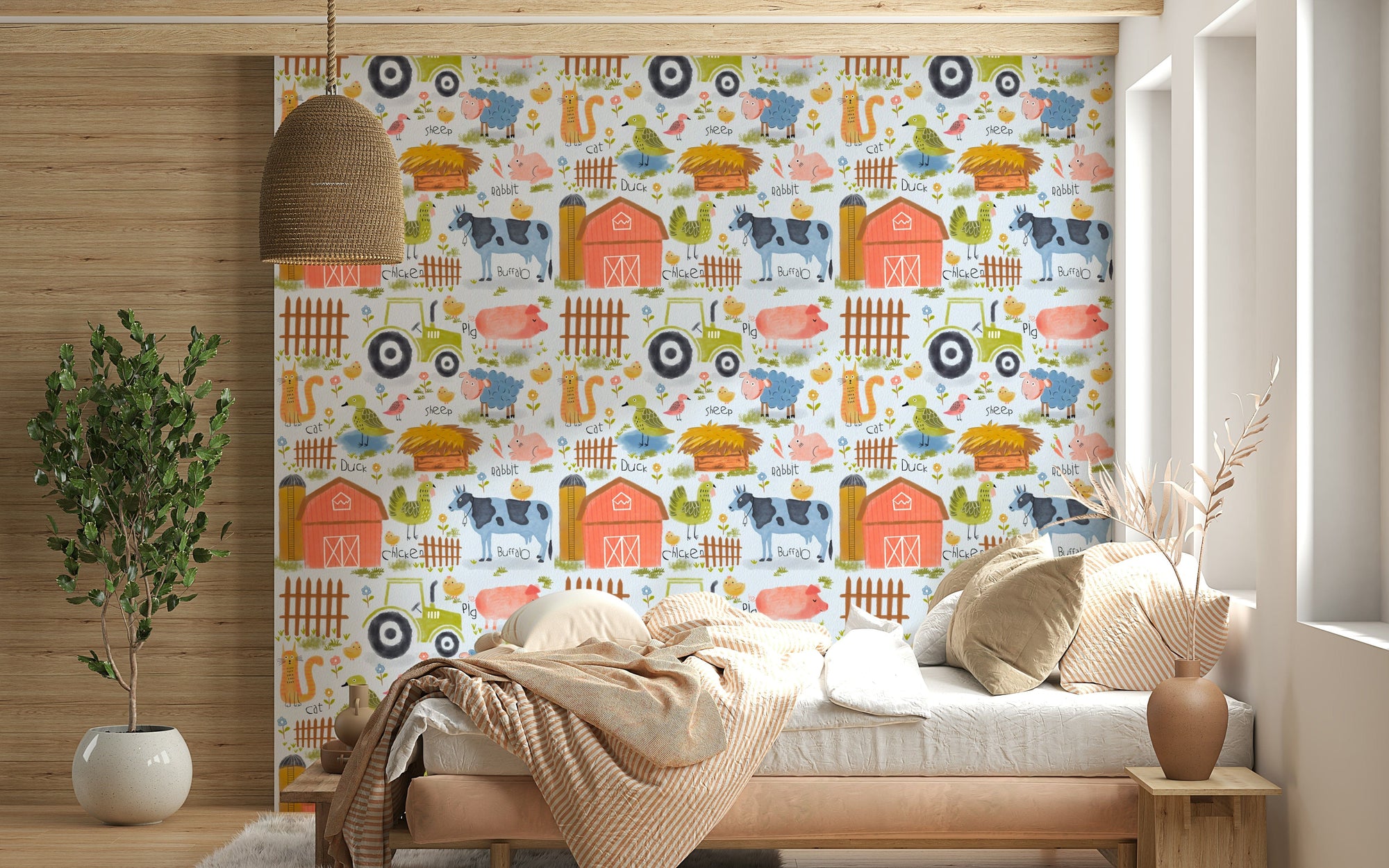 Farm Friends Fun wallpaper with red barns and cartoon animals in a bedroom with a wooden bed and rattan pendant