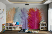 Pastel feather wall mural in soft pink, purple, and blue

