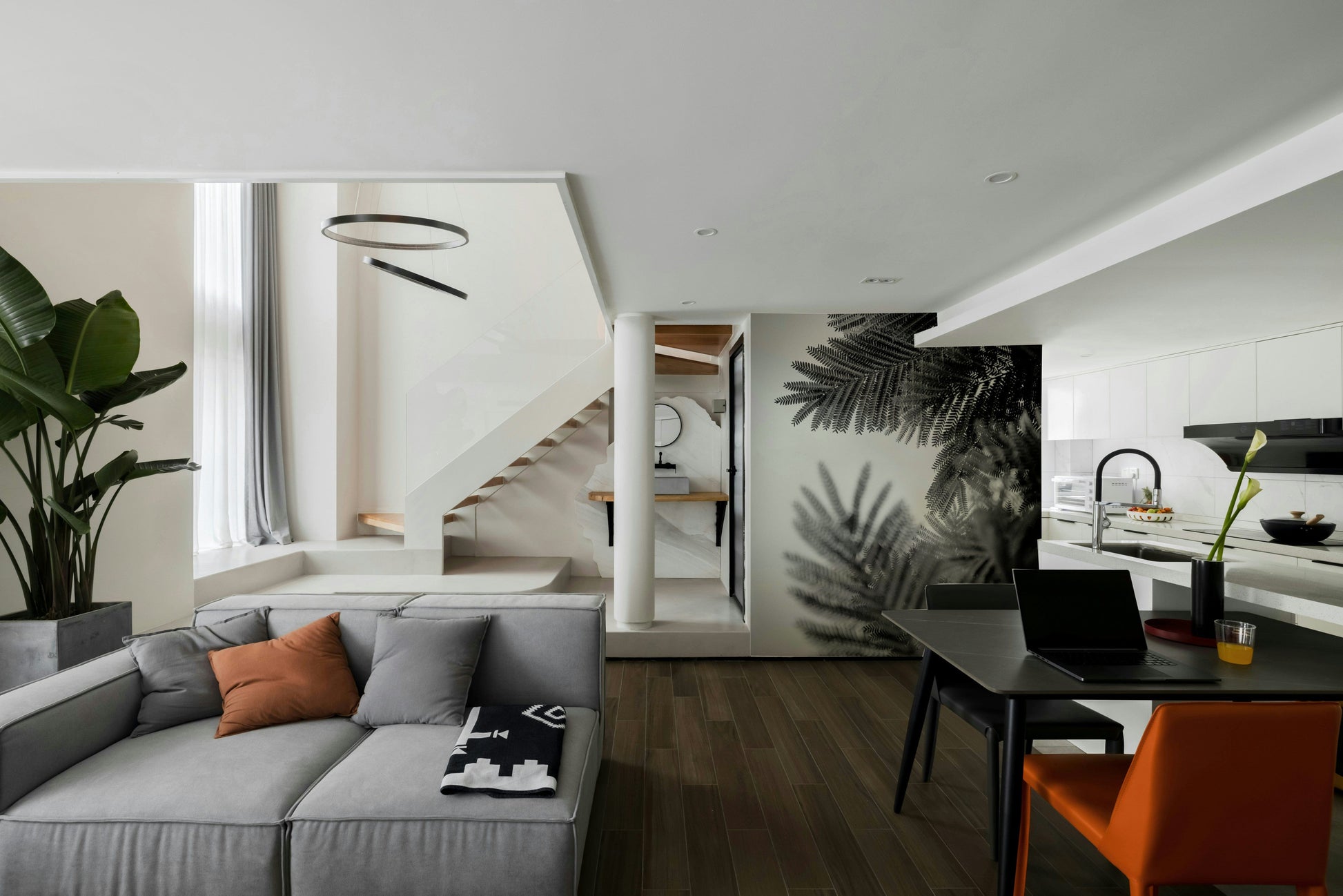 An artistic modern mural on minimalist wallpaper.

