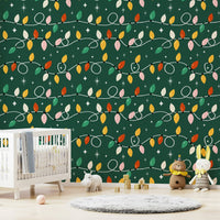 A charming Christmas wallpaper with looping strings of colorful retro-style lights.