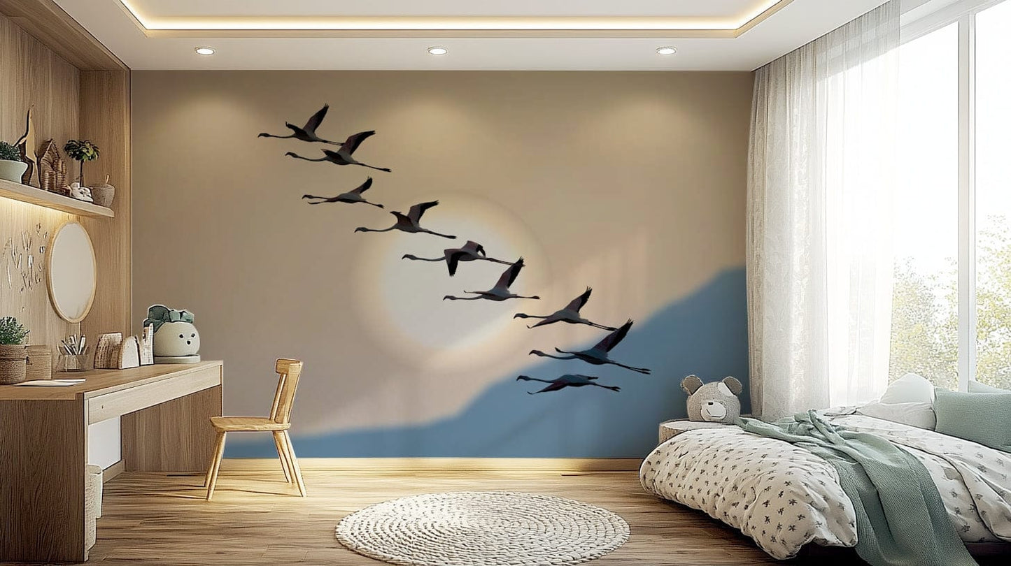 Wallpaper depicting silhouetted flamingos gliding over serene waters at dusk.