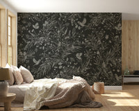 Dark-toned botanical mural featuring nocturnal birds resting amid blossoms