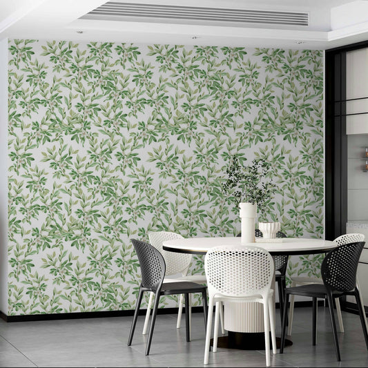 A bedroom decorated with a leaves mural

