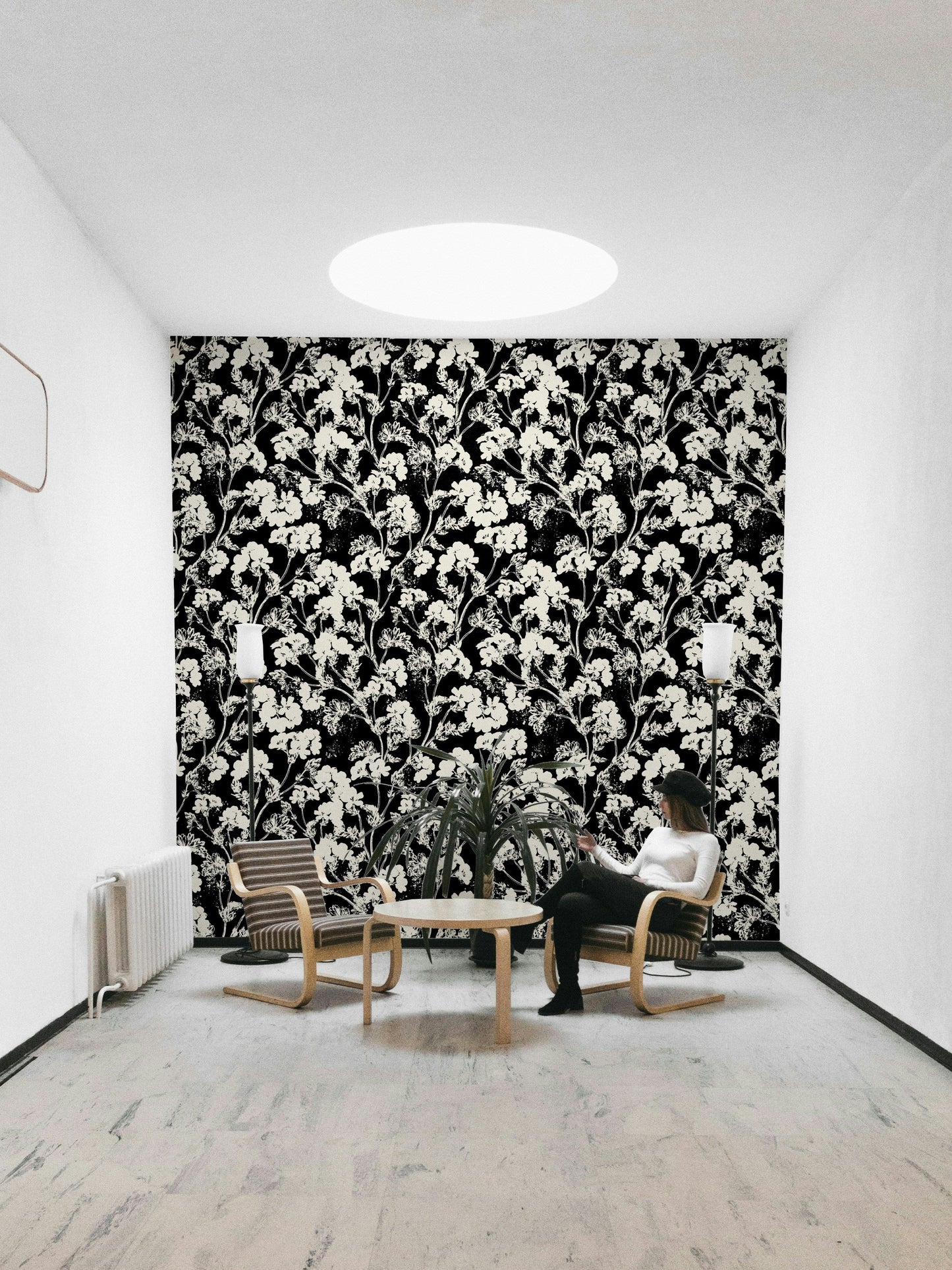 The colors are monochromatic, with different shades of white and off-white.
