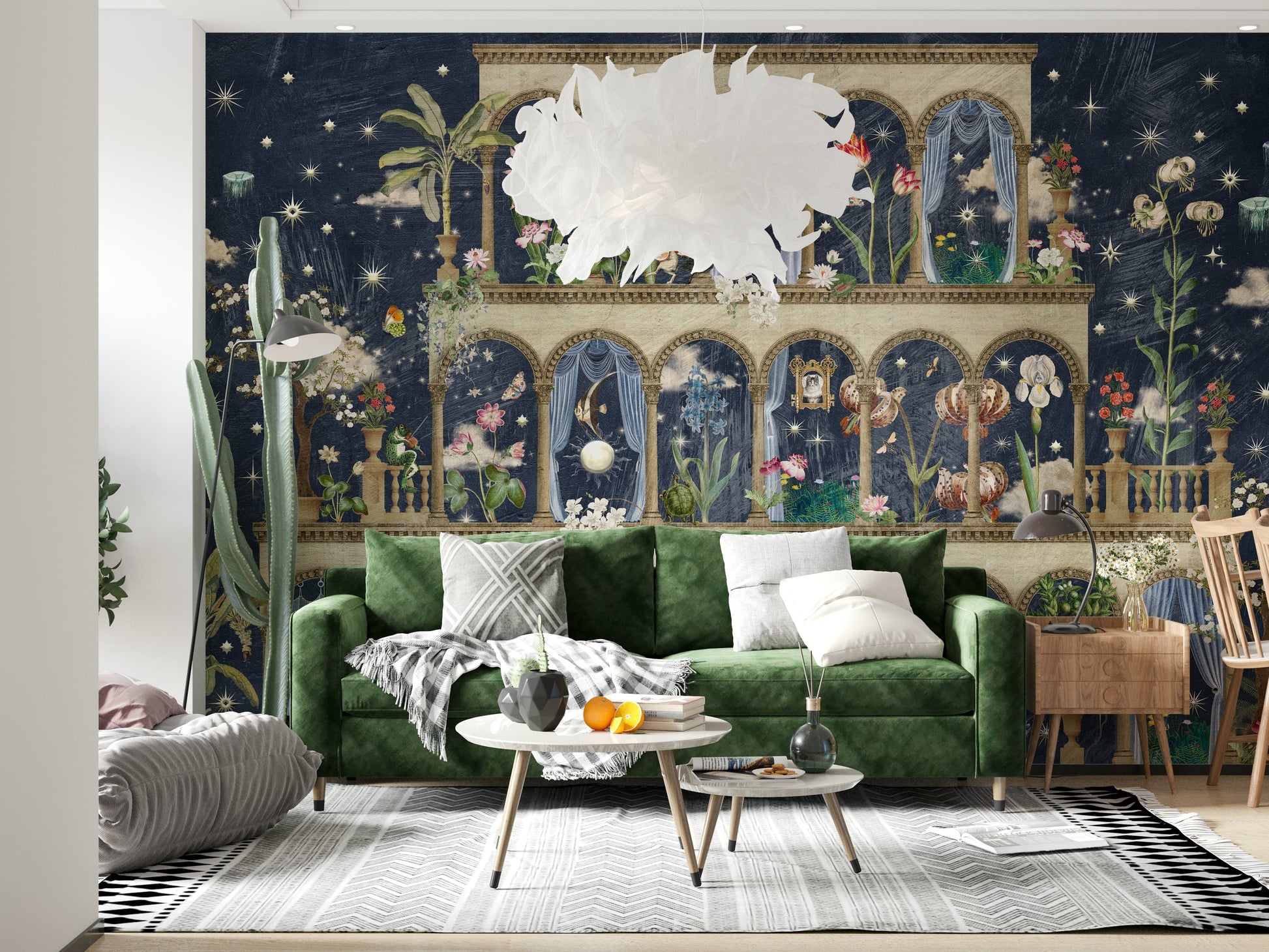 Botanical blue mural behind grey couch, moody floral feature wall for living space
