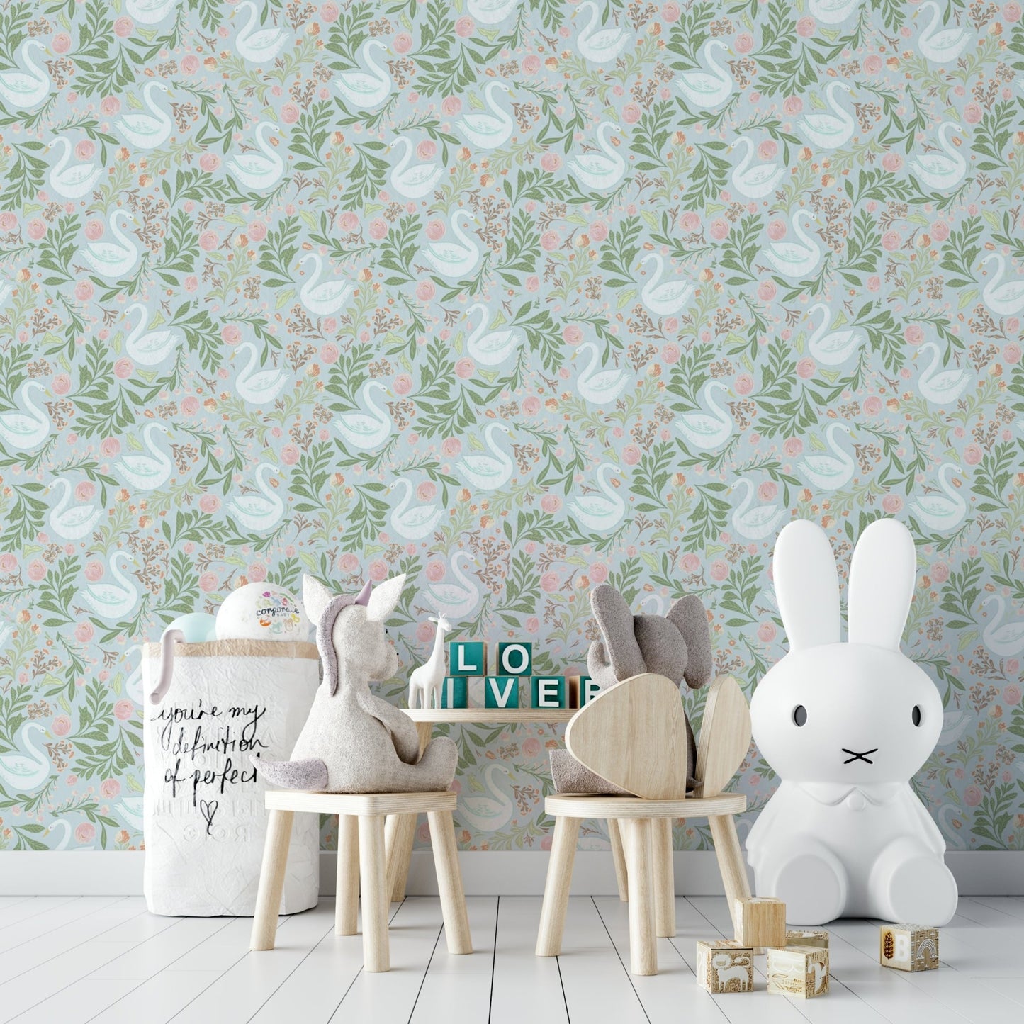 A wall mural of a peaceful floral and swan pattern.

