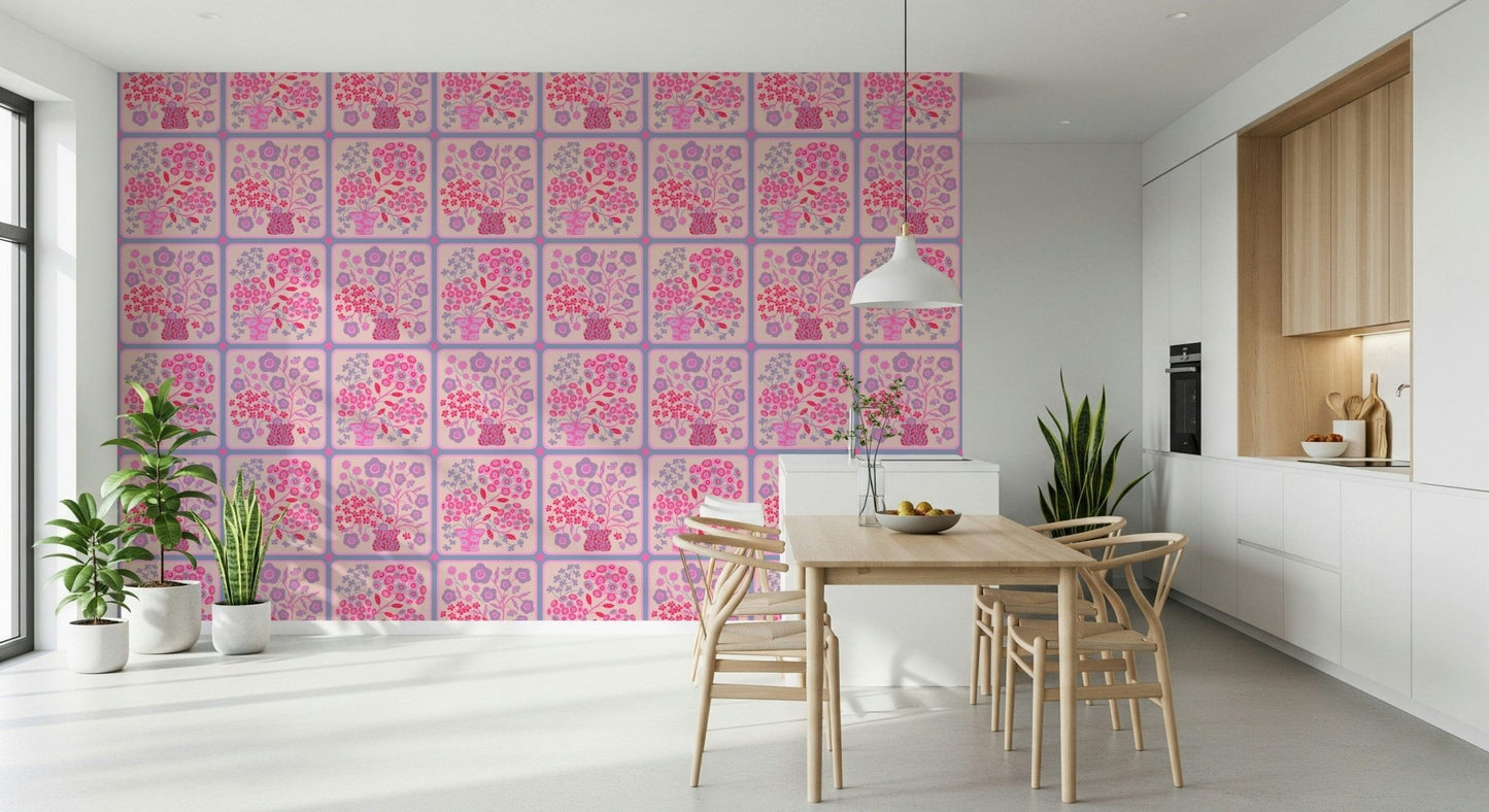 Pretty pink floral tile pattern wallpaper in a guest bathroom with gold fixtures.