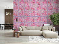 Modern living room featuring a fuchsia and lavender floral accent wall behind a gray sofa.