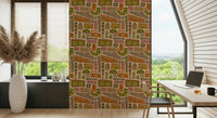 A warm bohemian wallpaper showcasing colorful patchwork tiles decorated with playful floral motifs.