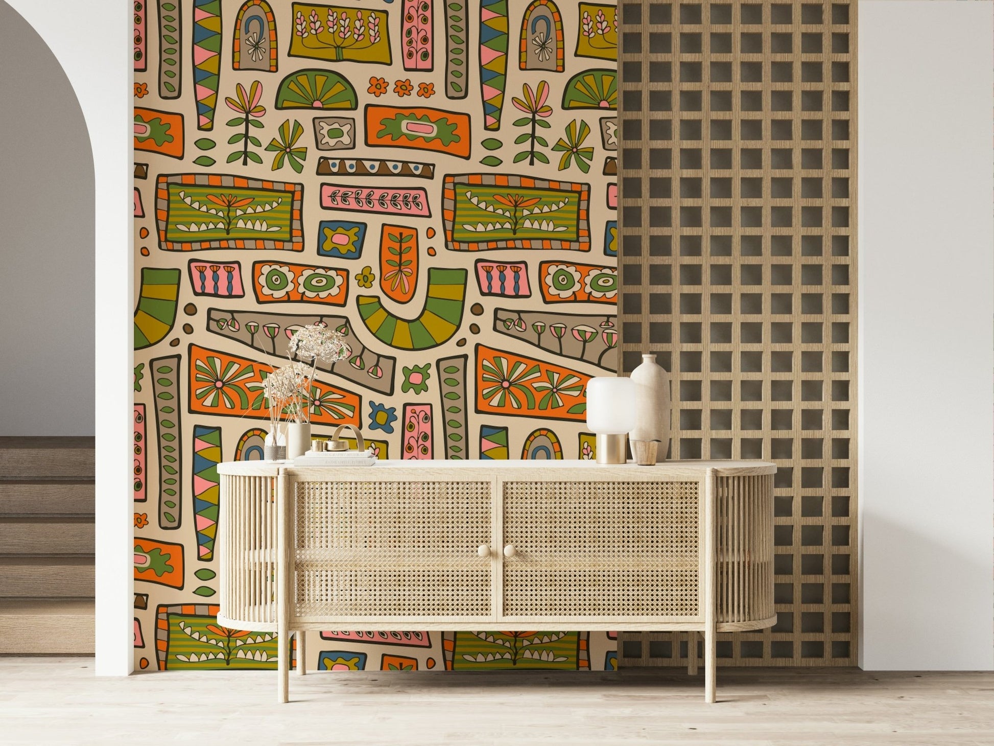 Earth-tone patchwork wallpaper filled with hand-drawn flowers, arches, and geometric accents.