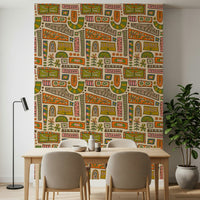 A bohemian patchwork wallpaper featuring warm earth-tone blocks filled with floral and geometric motifs.