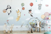 Whimsical flying animals mural for children
