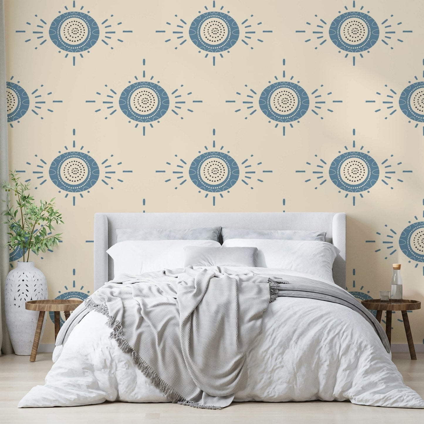 Folk Bloom Light Dusty Blue Cream Scandinavian Mid Mod Floral Wallpaper behind a velvet sofa.
